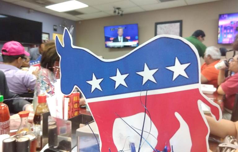 Tarrant County Democrats gathered to watch the Ohio Democratic debate in a Pho restaurant.
