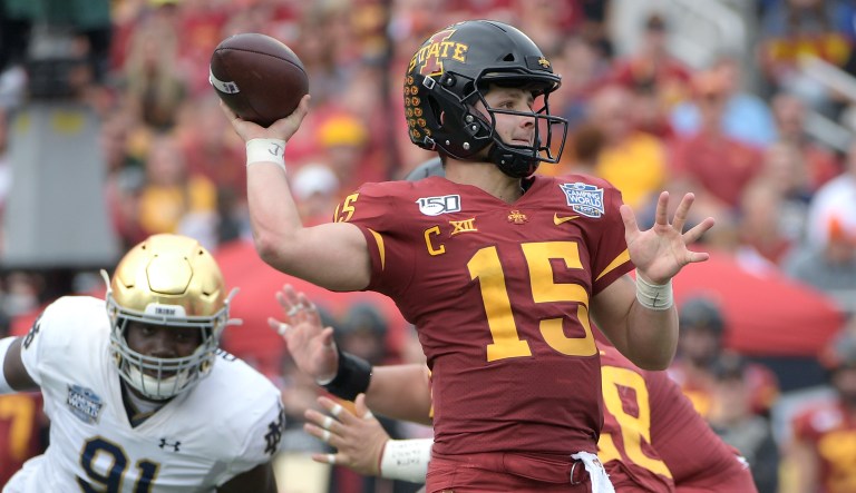FILE - In this Dec. 28, 2019, file photo, Iowa State quarterback Brock Purdy (15) throws a pass in front of Notre Dame defensive lineman Adetokunbo Ogundeji (91) during the first half of the Camping World Bowl NCAA college football game, in Orlando, Fla. Purdy, who led the most productive offense in program history, has the look of a high-round pick if he declares for the NFL draft after his junior year.