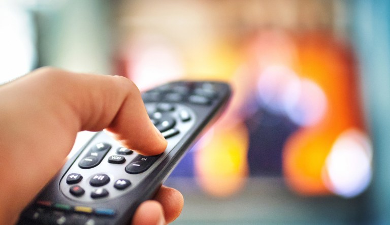 A television remote is shown.