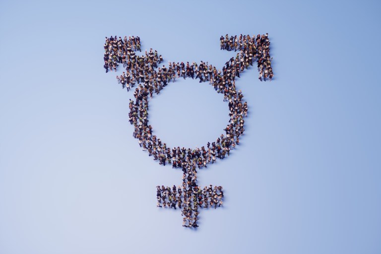 Crowd of people shaped like transgender symbol. 