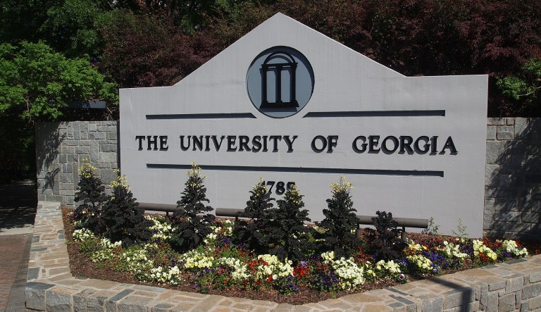 A sign marks the border of the University of Georgia campus in Athens, Georgia.