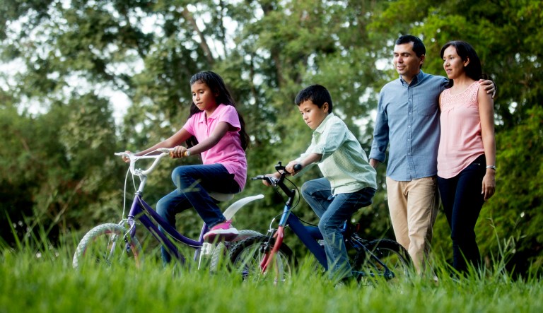 A family of Hispanic origin is shown.