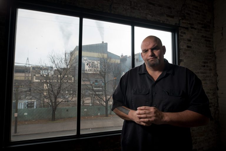 John Fetterman in his home, which overlooks U.S. Steel's Edgar Thomson Steel Works.