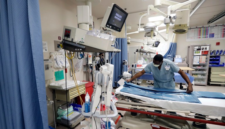 Survivors return to the scene on the first anniversary of a mass shooting, Monday, Oct. 1, 2018, in Las Vegas.