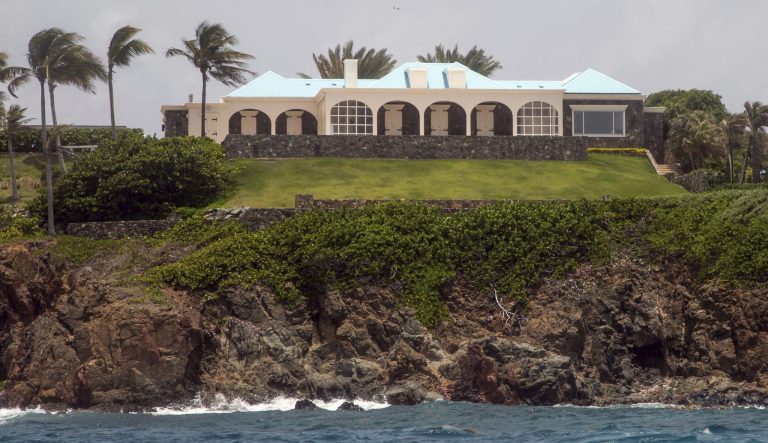 This Tuesday, July 9, 2019 photo shows a structure on Little Saint James Island, in the U. S. Virgin Islands. Locals recalled seeing Jeffery Epstein's black helicopter flying back and forth from the international airport in St. Thomas to his helipad on Little St. James Island, where he built a cream colored mansion with a bright turquoise roof surrounded by several other structures including the maids' quarters and a massive, square-shaped white building on one end of the island that some say is a music room fitted with acoustic walls.