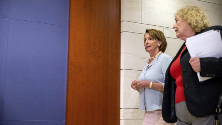 House Minority Leader Nancy Pelosi of Calif., left, and Rep. Zoe Lofgren, D-Calif., right, arrive for a classified briefing for all House members on Capitol Hill, in Washington, Wednesday, July 22, 2015, where Secretary of State John Kerry, Secretary of Energy Ernest Moniz, and Secretary of Treasury Jack Lew, speak about the deal reached to curb Iran's nuclear program in exchange for billions of dollars in relief from international sanctions. 