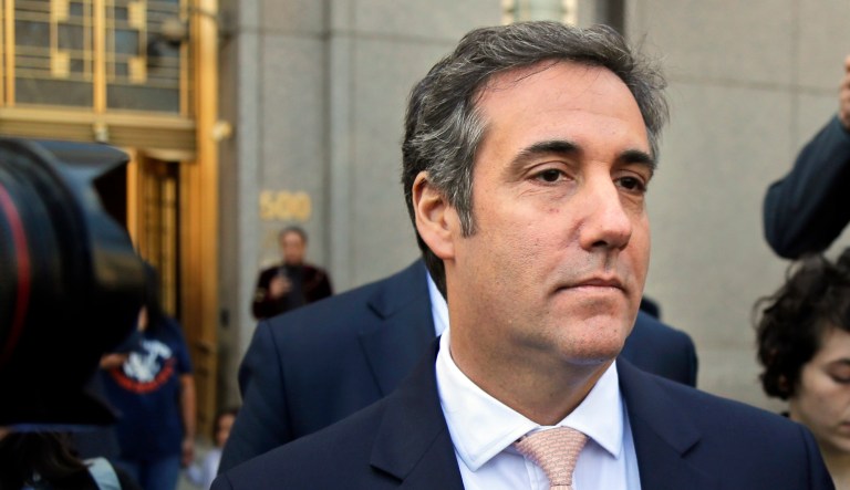 FILE - In this April 26, 2018 file photo, Michael Cohen leaves federal court in New York City. Criminal investigators are finally getting to study materials seized in raids on the home and office of President Donald Trump's personal lawyer, Cohen. Their ability to work with the results of the raid were delayed for weeks after attorneys for the attorney, Cohen, went to Manhattan federal court to get a role in deciding what should be subject to attorney-client privilege.