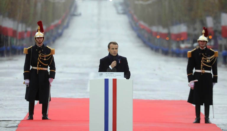 French President Emmanuel Macron delivers a speech during a ceremony at the Arc de Triomphe in Paris as part of the commemorations marking the 100th anniversary of the 11 November 1918 armistice, ending World War I, Sunday, Nov. 11, 2018. 