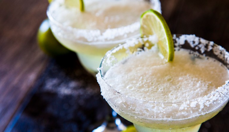 Frozen margaritas with lime and salt. 