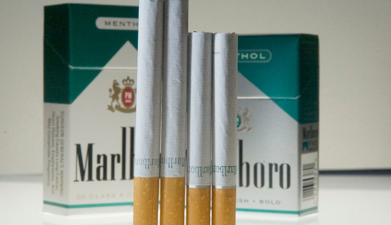 Two Marlboro Menthol 72mm cigarettes stand next to two regular size Marlboro Menthol cigarettes for a photograph in New York on July 20, 2004.