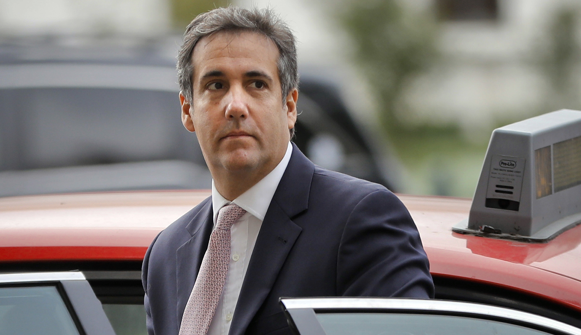In this Sept. 19, 2017 file photo, Michael Cohen, President Donald Trump's personal attorney, steps out of a cab during his arrival on Capitol Hill in Washington. (AP Photo/Pablo Martinez Monsivais)