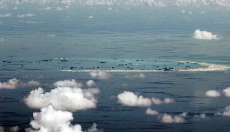 FILE - This May 11, 2015, file photo, shows land reclamation of Mischief Reef in the Spratly Islands in the South China Sea. An international tribunal has found that there is no legal basis for China's claiming rights to much of the South China Sea. The Permanent Court of Arbitration (PCA) issued its ruling Tuesday, July 12, 2016, in The Hague in response to an arbitration case brought by the Philippines against China regarding the South China Sea, saying that any historic rights to resources that China may have had were wiped out if they are incompatible with exclusive economic zones established under a U.N. treaty.