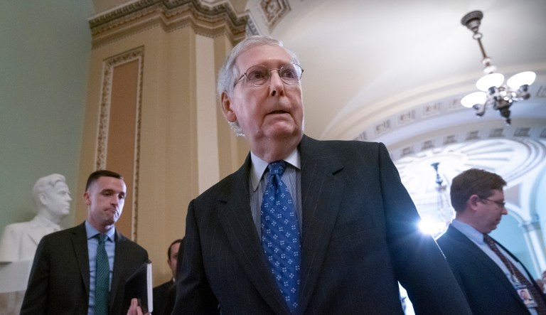 Senate Majority Leader Mitch McConnell, R-Ky., returns to the chamber after speaking to reporters at the Capitol in Washington, Tuesday, April 30, 2019.