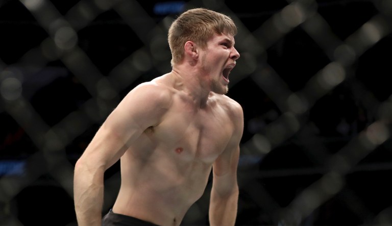 Bryce Mitchell celebrates a win against Matt Sayles after their mixed martial arts bout at UFC Fight Night, Saturday, December 7, 2019, in Washington, D.C. Mitchell won via first-round submission.