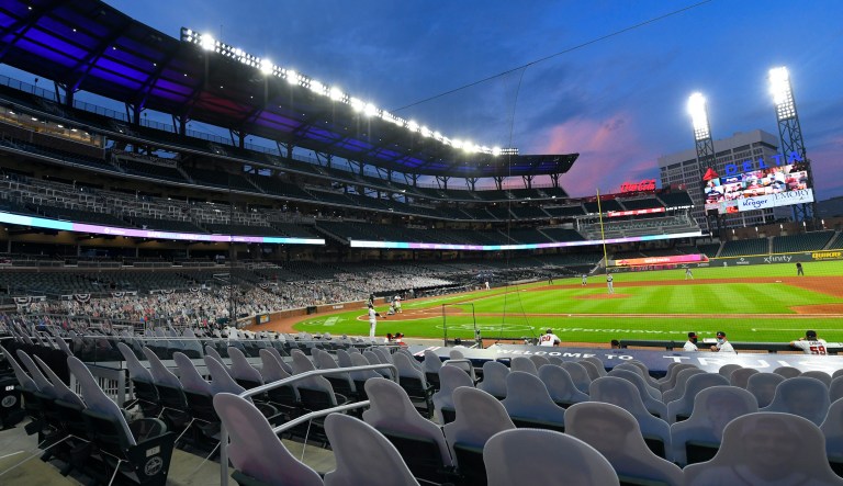 FILE - Cardboard cutouts of fans in the otherwise empty seats face the field during the sixth inning of a baseball game between the Atlanta Braves and Tampa Bay Rays in Atlanta, in this Thursday, July 30, 2020, file photo. Georgiaâs new voting law _ which critics claim severely limits access to the ballot box, especially for people of color _ has prompted calls from as high as the White House to consider moving the midsummer classic out of Atlanta. The game is set for July 13 at Truist Park, the Bravesâ 41,000-seat stadium in suburban Cobb County.