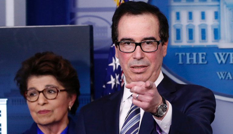 Treasury Secretary Steve Mnuchin leads a meeting of the Financial Stability Oversight Council, Tuesday, Oct. 16, 2018, at the Treasury Department in Washington.