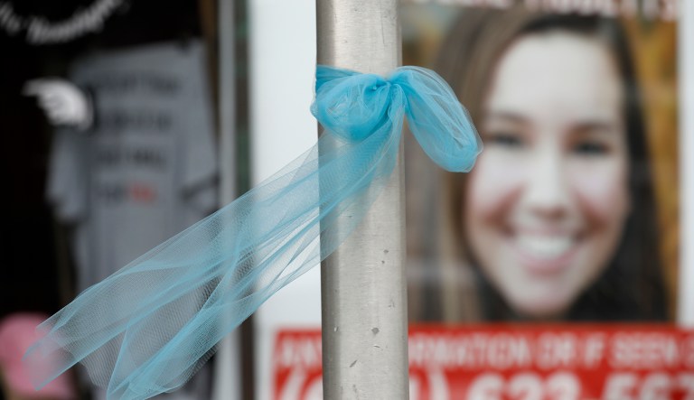 A ribbon for missing University of Iowa student Mollie Tibbetts hangs on a light post, Tuesday, Aug. 21, 2018, in Brooklyn, Iowa. Tibbetts was reported missing from her hometown in the eastern Iowa city of Brooklyn in July 2018.