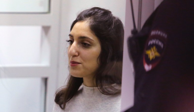 Israeli woman Naama Issachar,  sits inside a cage during appeal hearings in a courtroom in Moscow, Russia, Thursday, Dec. 19, 2019.