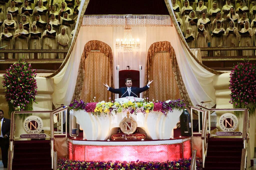 Nasson Joaquin Garcia leads a church service.jpg