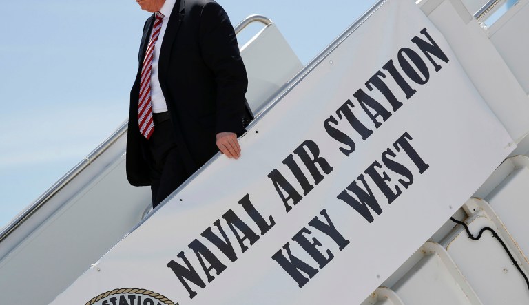 President Donald Trump walks down the stairs during his arrival at Naval Air Station Key West on Air Force One in Key West, Fla., Thursday, April 19, 2018. Trump is visiting Joint Interagency Task Force South anti-smuggling center in Key West Fla.