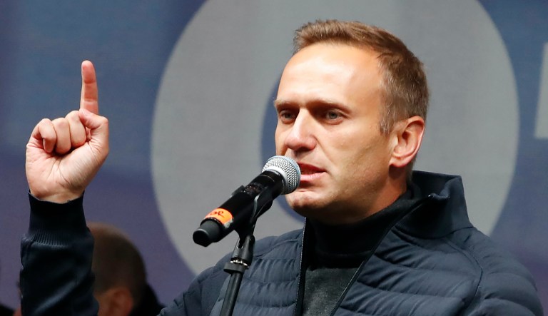 In this Sunday, Sept. 29, 2019 file photo Russian opposition leader Alexei Navalny speaks during a rally to support political prisoners in Moscow, Russia. Thousands of people are rallying in Moscow to demand the release of those who were arrested during a wave of opposition demonstrations this summer. Russian opposition politician Alexei Navalny was placed on a ventilator in a hospital intensive care unit in Siberia after falling ill from suspected poisoning during a flight, his spokeswoman said Thursday Aug. 20, 2020.