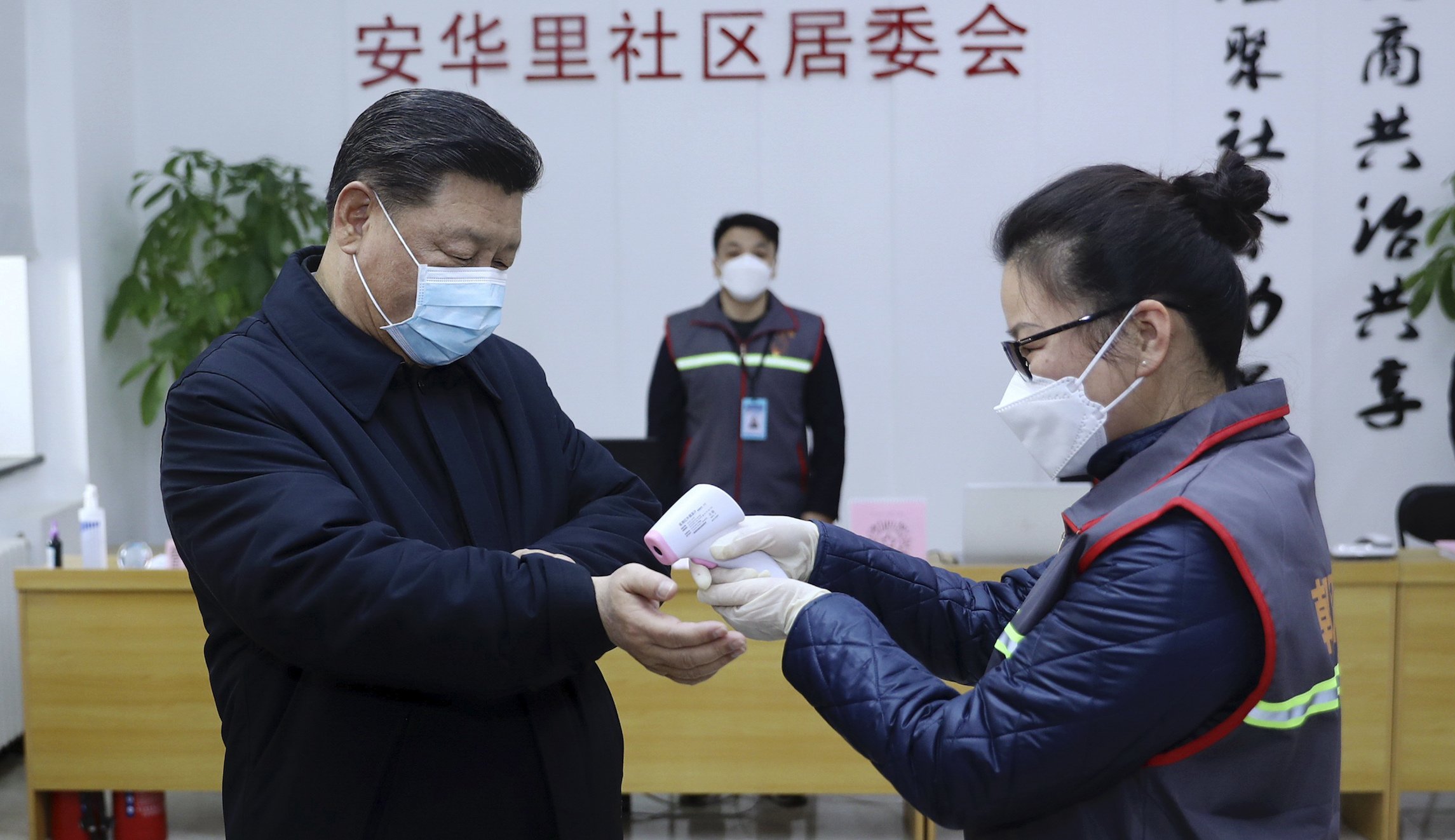 Xi Jinping gets his temperature taken