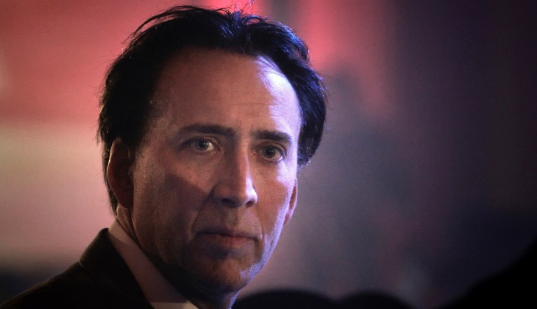 US actor Nicholas Cage looks on at a charity event in Bucharest, Romania, Saturday night, Oct. 30, 2010. Cage is in Romania working on the movie Ghost Rider 2.