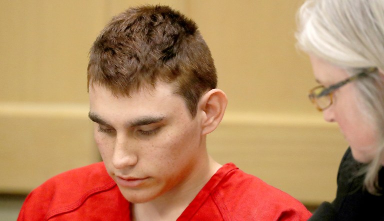 Nikolas Cruz, accused of murdering 17 people in the Florida high school shooting, appears in court for a status hearing in Fort Lauderdale, Fla. Cruz was formally charged with 17 counts of first-degree murder.