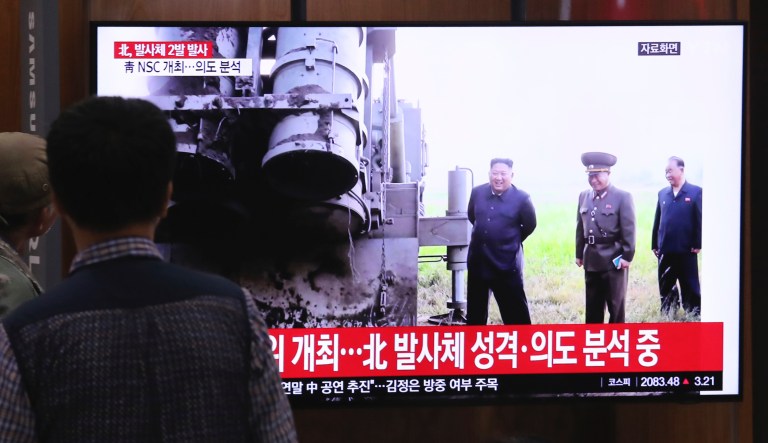 People watch a TV showing a file image of North Korean leader Kim Jong Un during a news program at the Seoul Railway Station in Seoul, South Korea, Thursday, Oct. 31, 2019.