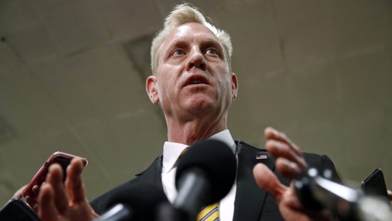 Acting Secretary of Defense Patrick Shanahan listens as President Trump speaks during a Cabinet meeting at the White House, Wednesday, Jan. 2, 2019, in Washington.
