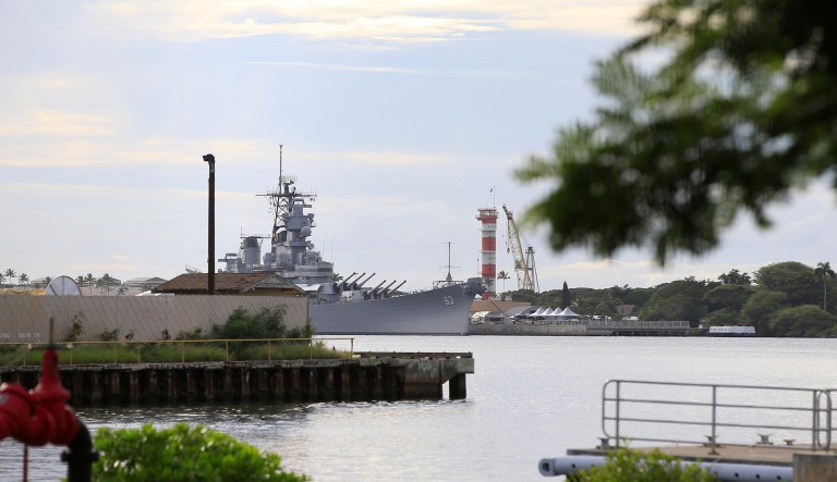A U.S. naval ship can been seen from Pearl Harbor National Memorial Wednesday, Dec. 4, 2019, in Honolulu.