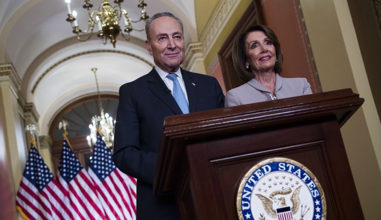 Senate Minority Leader Chuck Schumer, a Democrat from New York, left, and House Speaker Nancy Pelosi, a Democrat from California, stand after delivering the Democrats' response to President Trump's address on border security at the U.S. Capitol in Washington, D.C., on Tuesday, Jan. 8, 2019. 