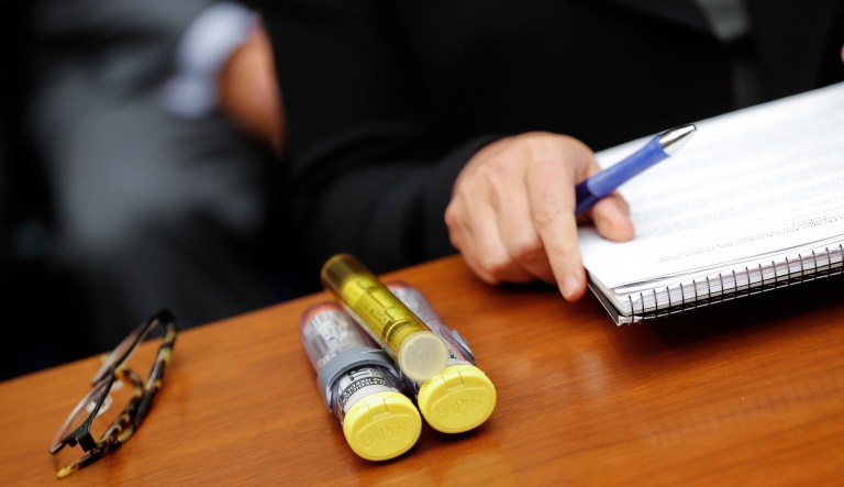In this Sept. 21, 2016, file photo, EpiPens brought by Mylan CEO Heather Bresch are seen on Capitol Hill in Washington as she testifies before the House Oversight Committee hearing on EpiPen price increases.