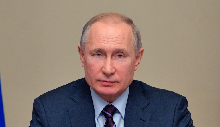 Russian President Vladimir Putin chairs a Security Council meeting at the Novo-Ogaryovo residence outside Moscow Moscow, Russia, Friday, Feb. 21, 2020.