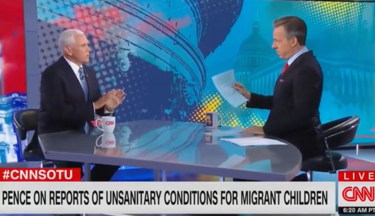 Jake Tapper and Mike Pence spar over immigration