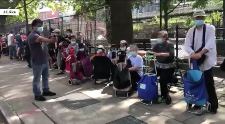 ‘Picture from the Great Depression’: New Yorkers form quarter-mile-long line to pick up groceries from food pantry