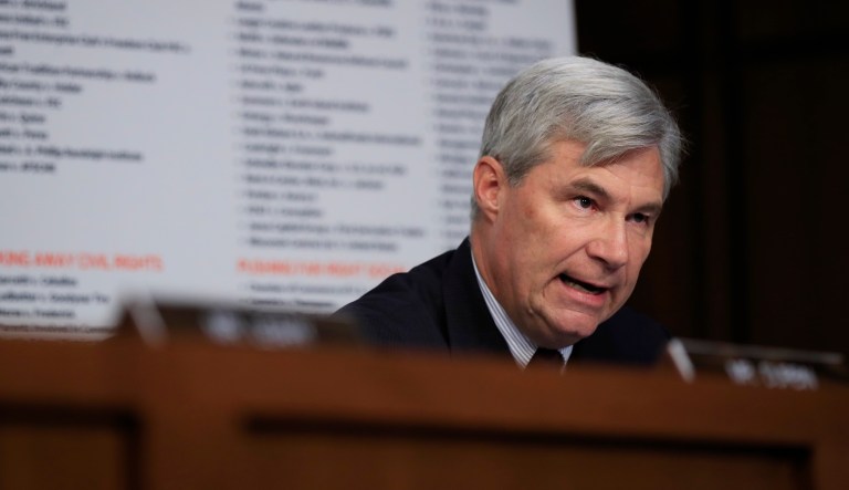 President Trump's Supreme Court nominee, Brett Kavanaugh, smiles at his wife as he arrives before the Senate Judiciary Committee on Capitol Hill, Sept. 5, 2018.
