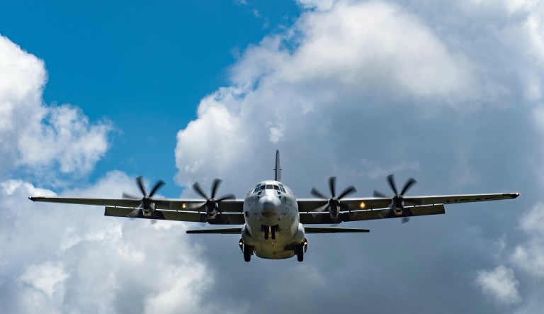 In this photo taken Aug. 26, 2019 and released by the U.S. Air Force, A U.S. Air Force C-130J Super Hercules approaches for landing at Camp Simba, Manda Bay, Kenya. 