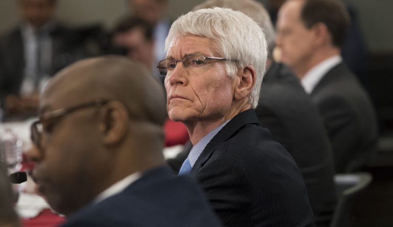 Thomas Barthold, the chief of staff for the Joint Committee on Taxation, listens as House and Senate tax bill conferees meet to work on the sweeping overhaul of the nation's tax laws, on Capitol Hill in Washington, Wednesday, Dec. 13, 2017.