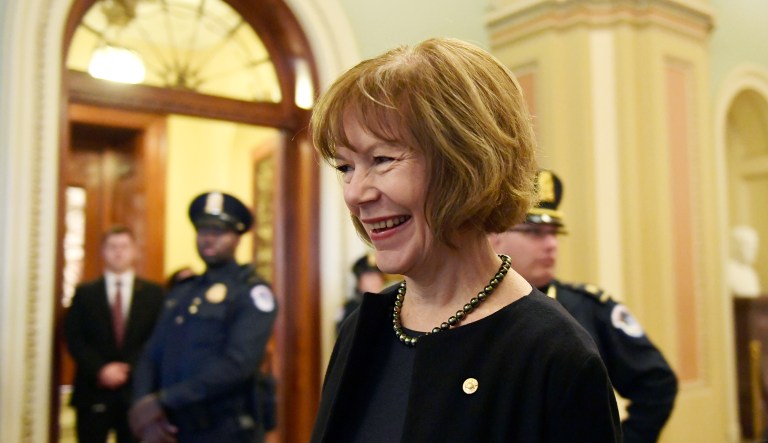Sen. Tina Smith, D-Minn., walks on Capitol Hill in Washington, Wednesday, Jan. 3, 2018, after being sworn in. The Republican majority in the Senate narrowed to 51-49 on Wednesday as two new Democratic senators were sworn into office, complicating GOP efforts to advance the party's legislative agenda before the 2018 midterm elections.