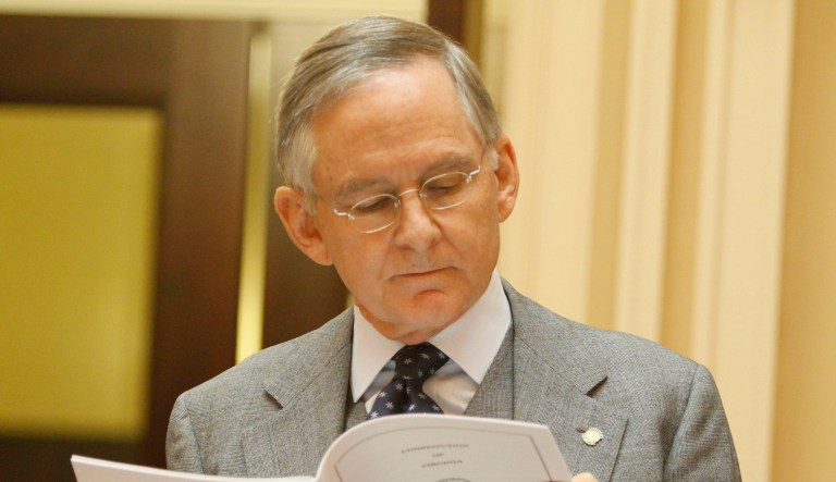 State Sen. Tommy Norment, R-James City County, looks over rules of the Senate during debate on the new Senate rules at the start of the 2012 session of the Virginia Senate at the Capitol in Richmond, Va., Wednesday, Jan. 11, 2012.
