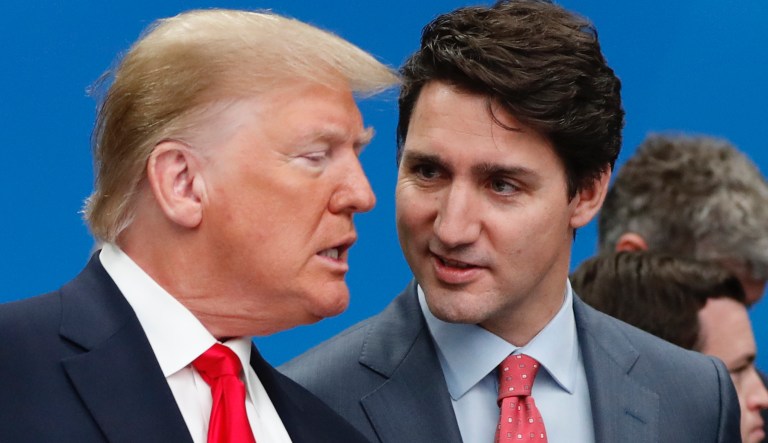 U.S. President Donald Trump, left, and Canadian Prime Minister Justin Trudeau talk prior to a NATO round table meeting at The Grove hotel and resort in Watford, Hertfordshire, England, Wednesday, Dec. 4, 2019.