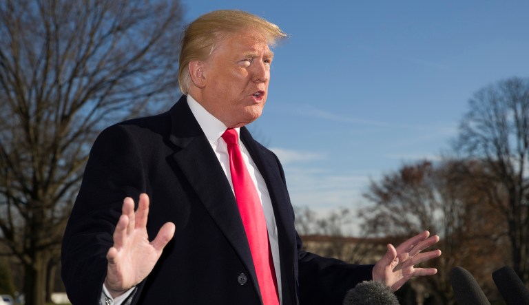 President Donald Trump speaks on the South Lawn of the White House after walking from Marine One, Sunday, Jan. 6, 2019, in Washington. Trump is returning from a trip to Camp David.
