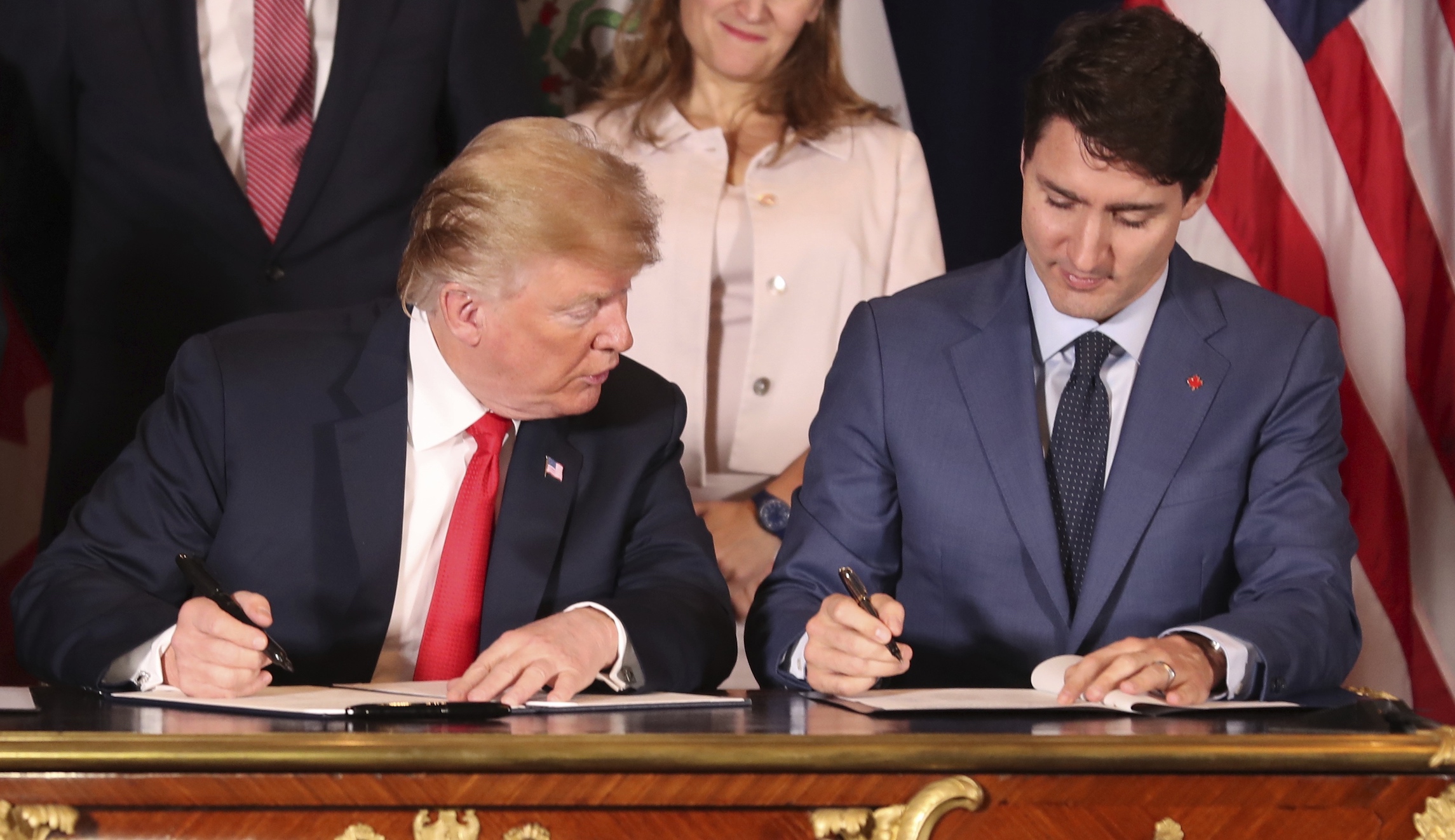 Trudeau needles Trump at trade deal signing by spurning USMCA name