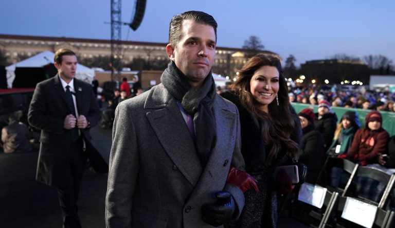 President Trump and first lady Melania Trump wave after lighting the National Christmas Tree on the Ellipse near the White House in Washington, Wednesday, Nov. 28, 2018.