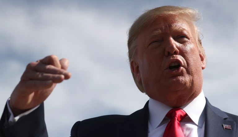President Donald Trump speaks as he arrives at Naval Air Station Joint Reserve Base in Fort Worth, Texas, Thursday, Oct. 17, 2019.