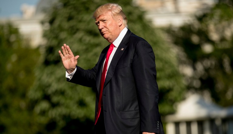 President Donald Trump walks across the South Lawn as he arrives at the White House in Washington, Friday, April 28, 2017, returning from traveling to Atlanta to speak at the National Rifle Association Leadership Forum.