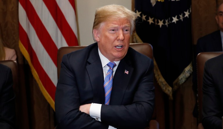 President Donald Trump speaks during his meeting with members of his cabinet in Cabinet Room of the White House in Washington, Wednesday, July 18, 2018.