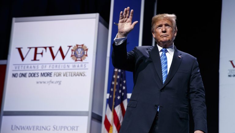 President Donald Trump waves after speaking during the Veterans of Foreign Wars of the United States National Convention, Tuesday, July 24, 2018, in Kansas City, Mo. 