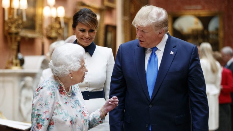 Britain's Queen Elizabeth II speaks to U.S President Donald Trump, right and first lady Melania as they view U.S memorabilia from the Royal Collection, at Buckingham Palace, London, Monday, June 3, 2019. Trump is on a three-day state visit to Britain. 